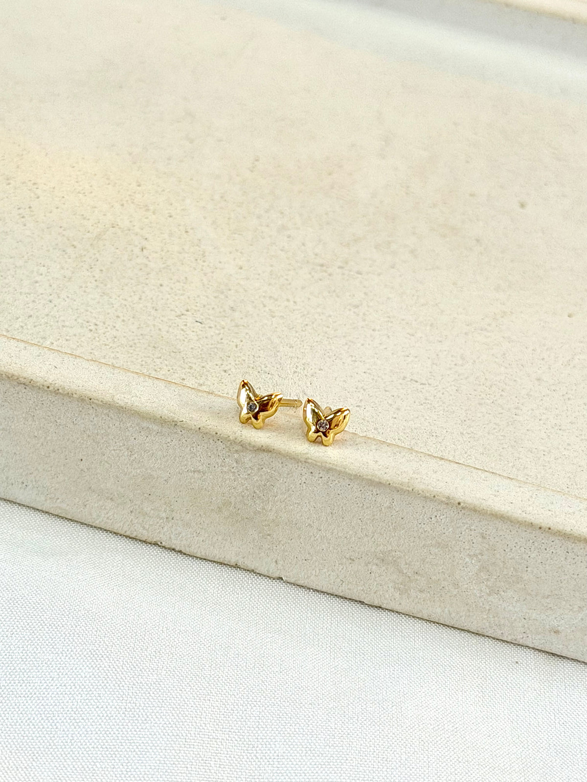 Brinco borboleta zircônia