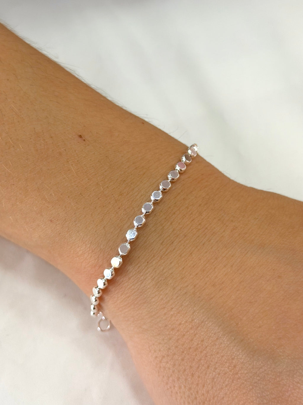 Pulseira bolinhas achatadas