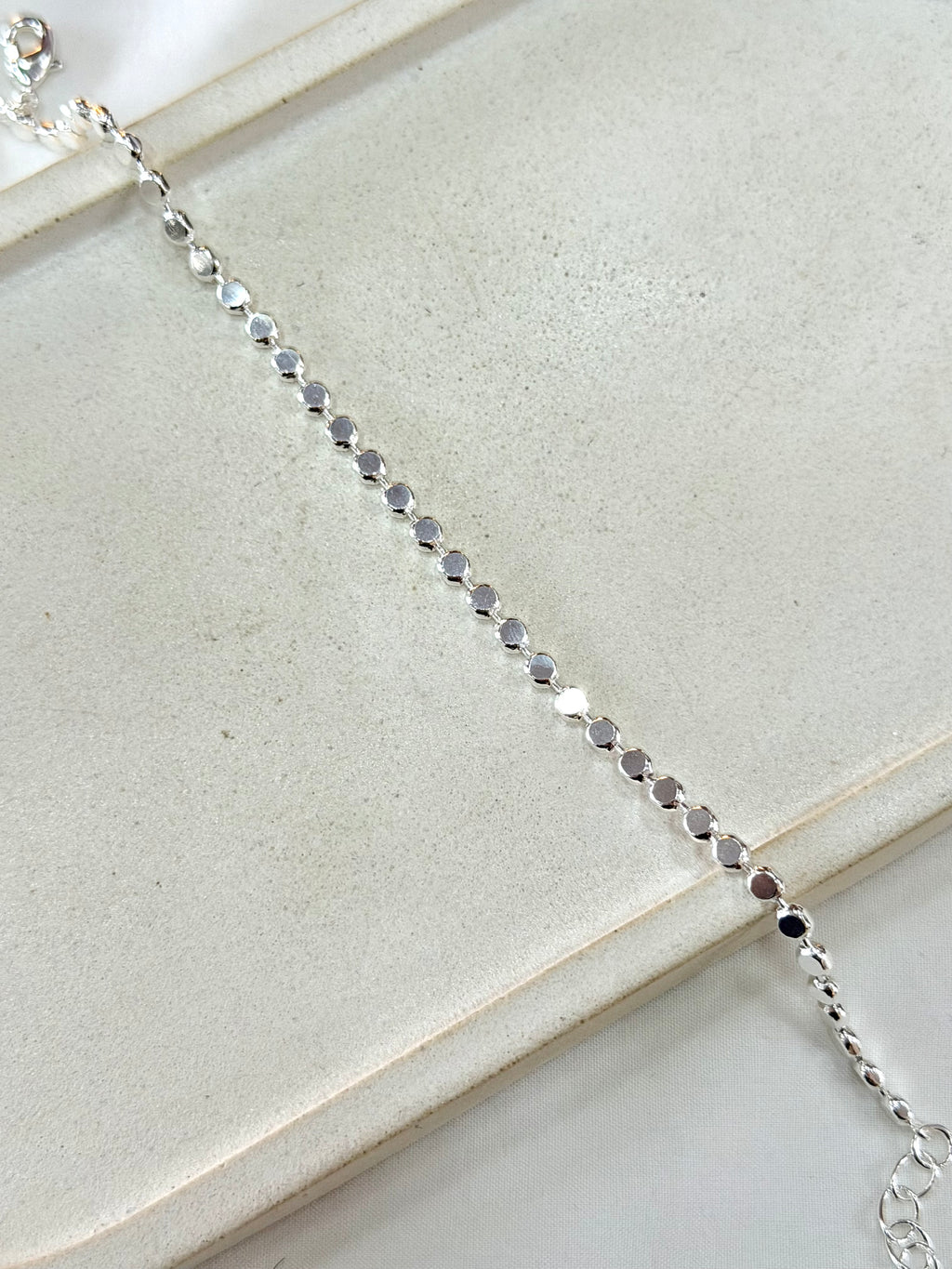 Pulseira bolinhas achatadas