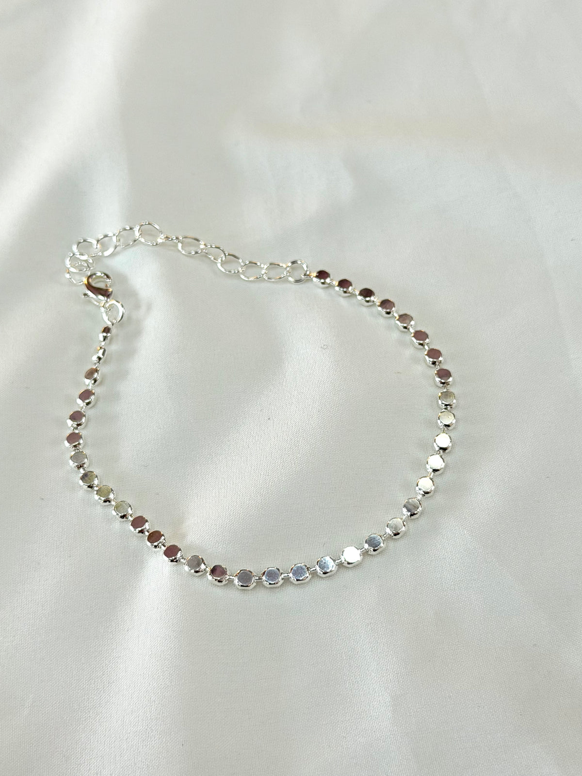 Pulseira bolinhas achatadas