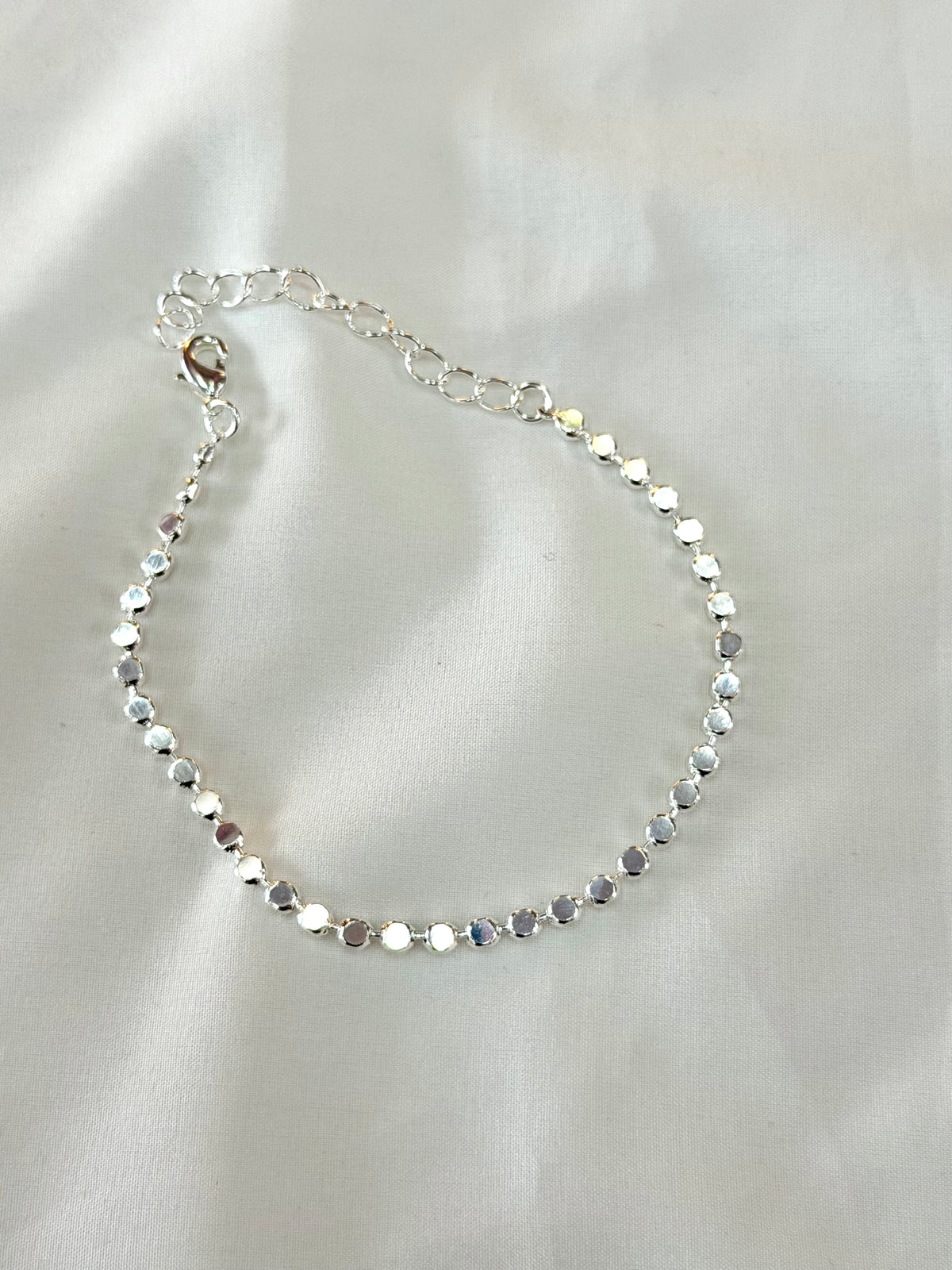 Pulseira bolinhas achatadas