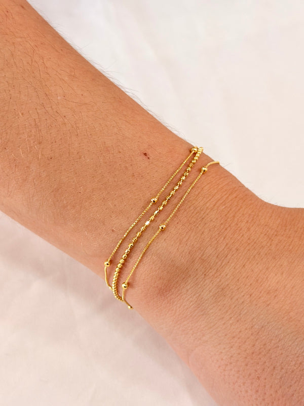 Pulseira tripla bolinhas
