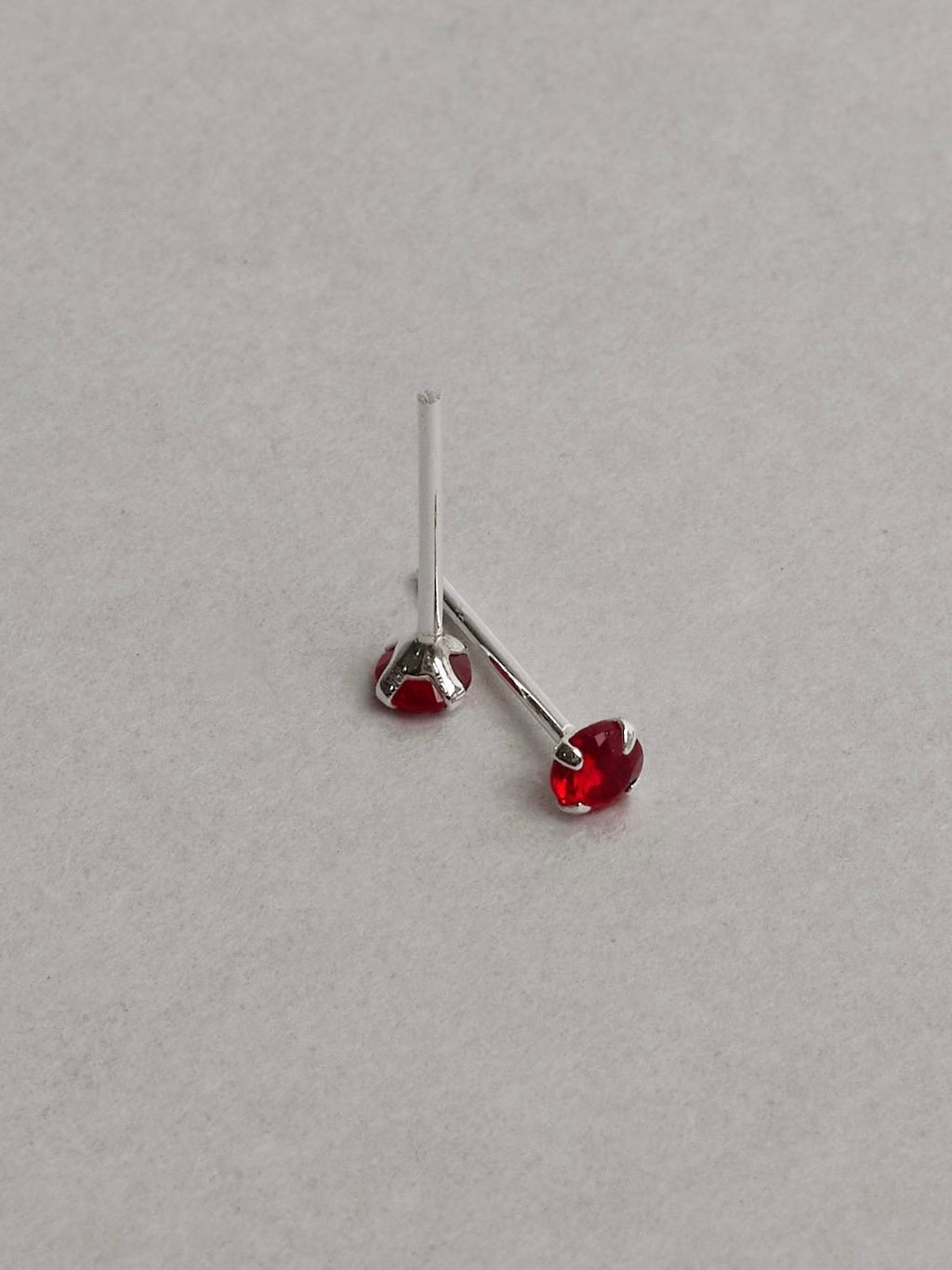 Brinco zircônia redonda rubi 3mm
