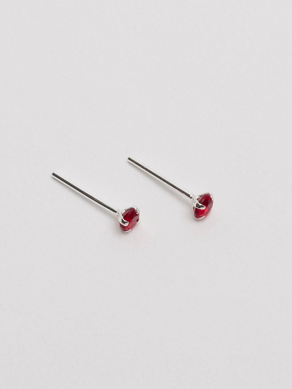 Brinco zircônia redonda rubi 3mm