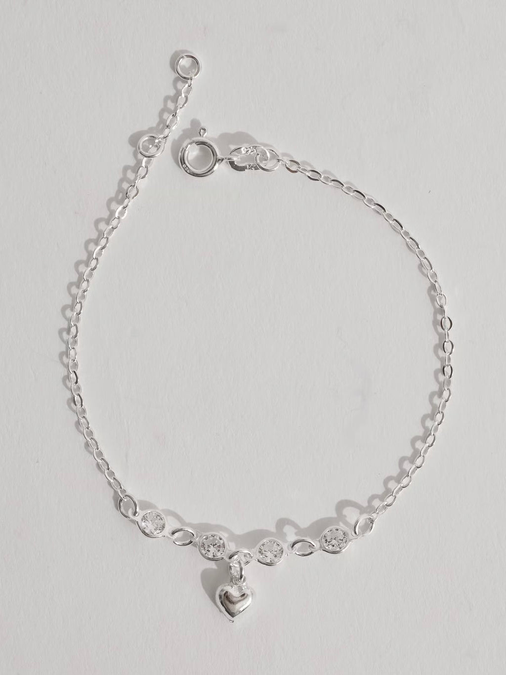 Pulseira entremeio zircônias pingente coração