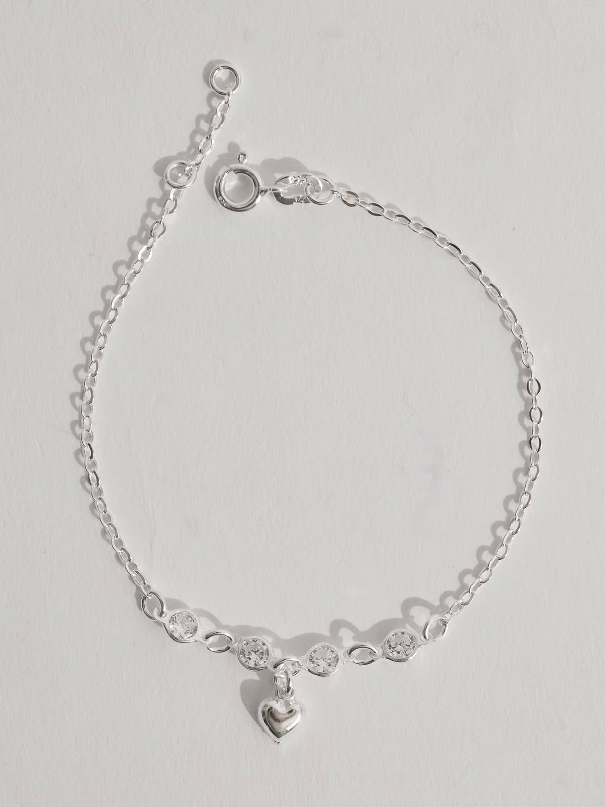 Pulseira entremeio zircônias pingente coração