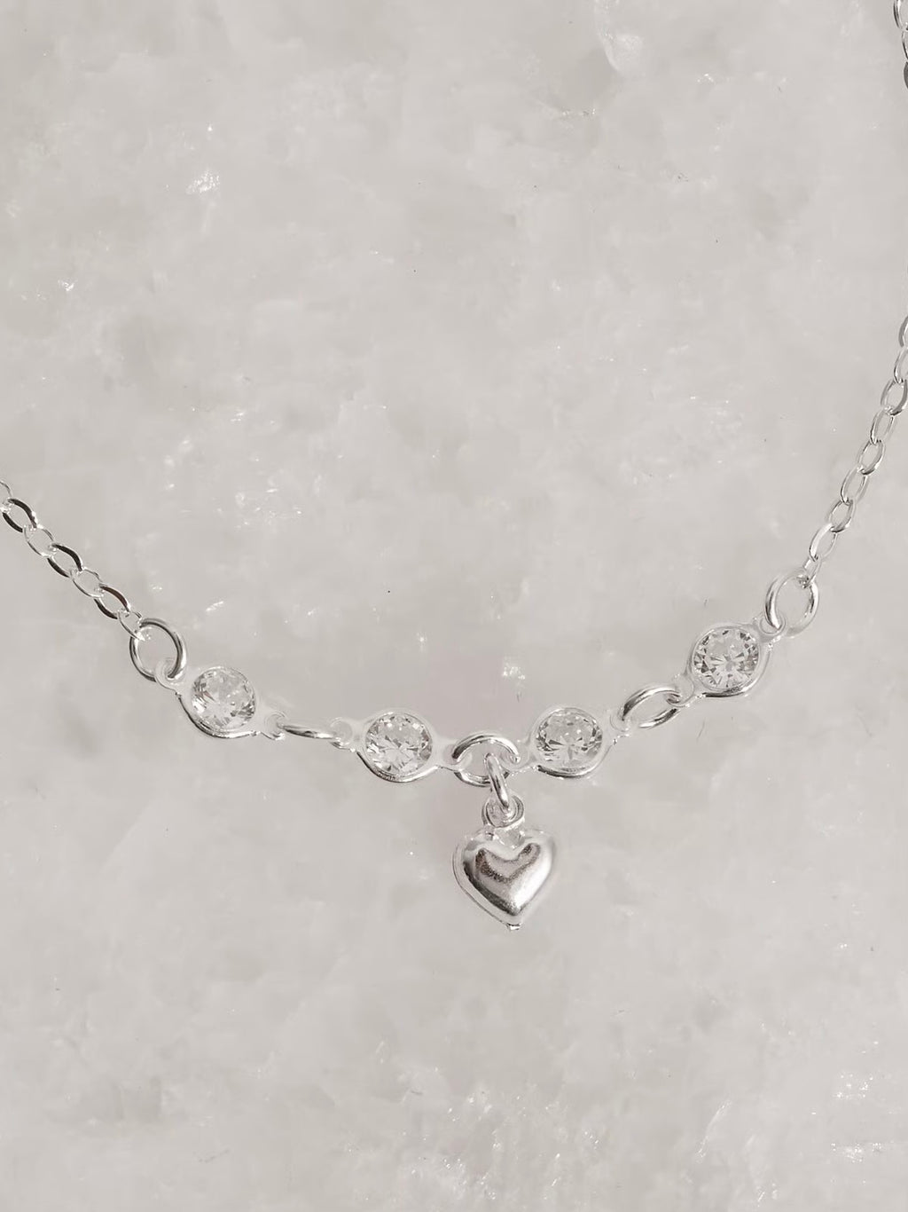 Pulseira entremeio zircônias pingente coração