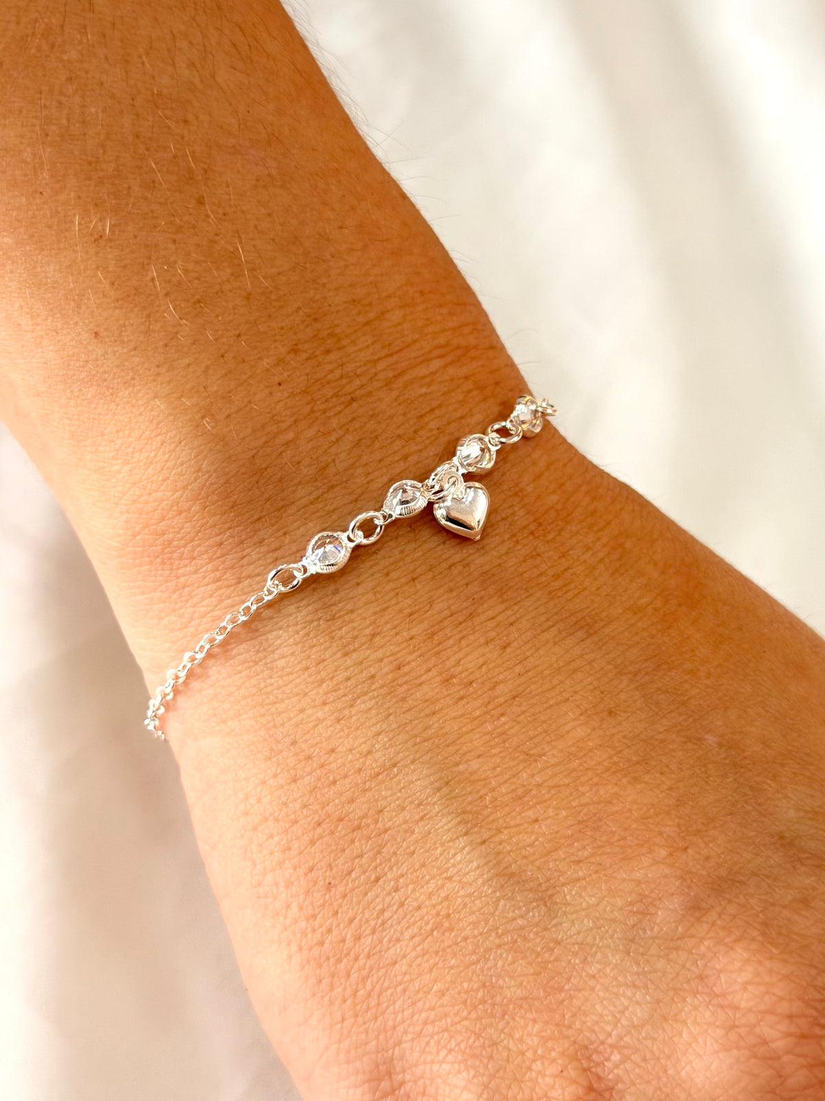 Pulseira entremeio zircônias pingente coração