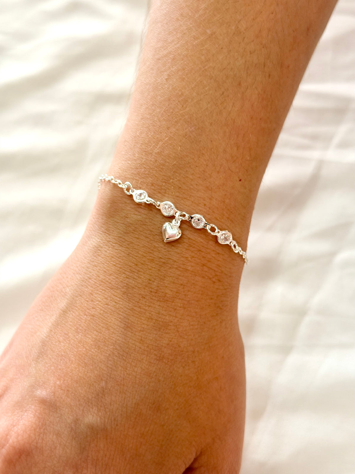 Pulseira entremeio zircônias pingente coração