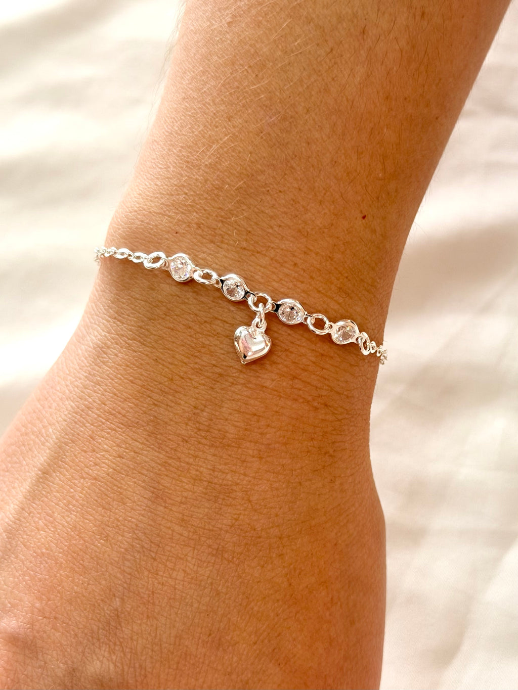 Pulseira entremeio zircônias pingente coração